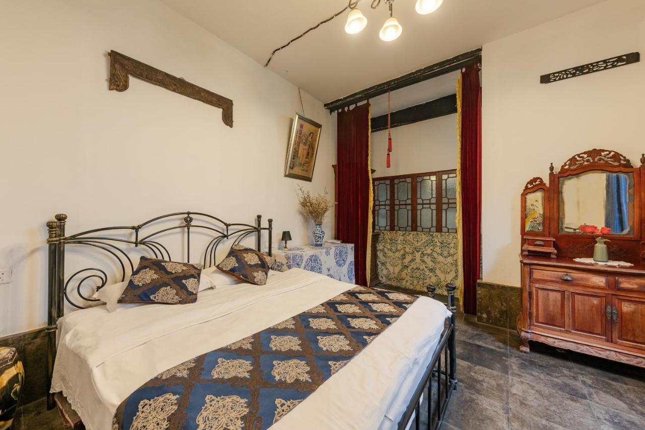 סוג'ואו The Glance Back Garden Hotel מראה חיצוני תמונה