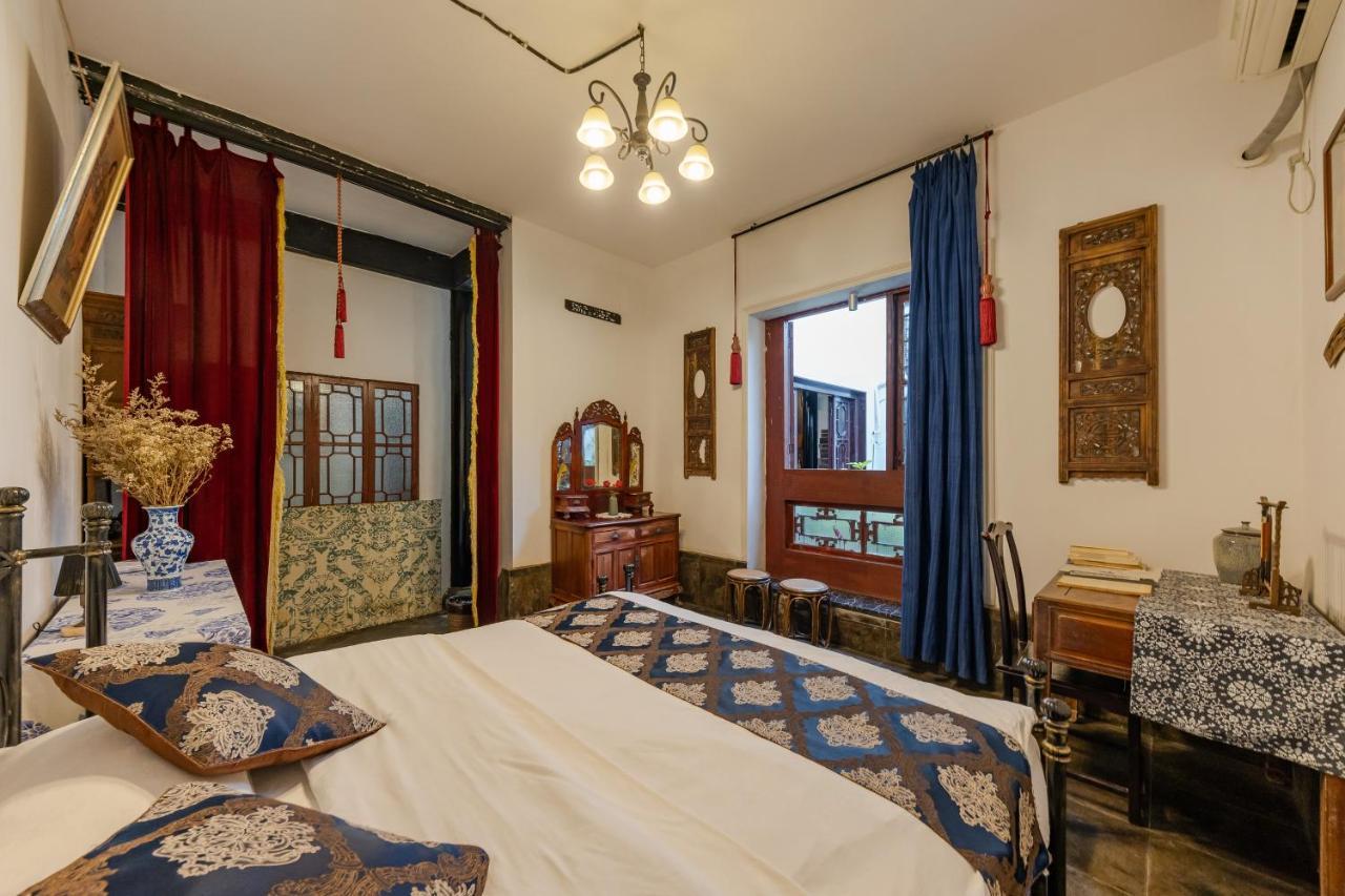 סוג'ואו The Glance Back Garden Hotel מראה חיצוני תמונה