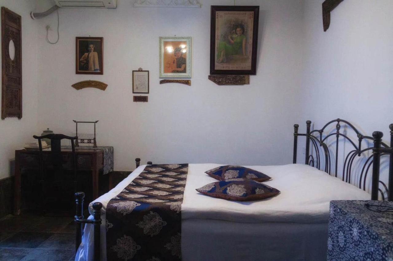 סוג'ואו The Glance Back Garden Hotel מראה חיצוני תמונה